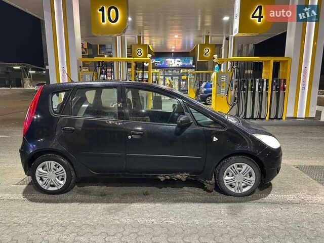 Черный Мицубиси Кольт, объемом двигателя 1.3 л и пробегом 231 тыс. км за 2999 $, фото 1 на Automoto.ua