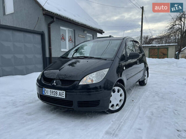 Чорний Міцубісі Кольт, об'ємом двигуна 1.33 л та пробігом 197 тис. км за 4999 $, фото 1 на Automoto.ua