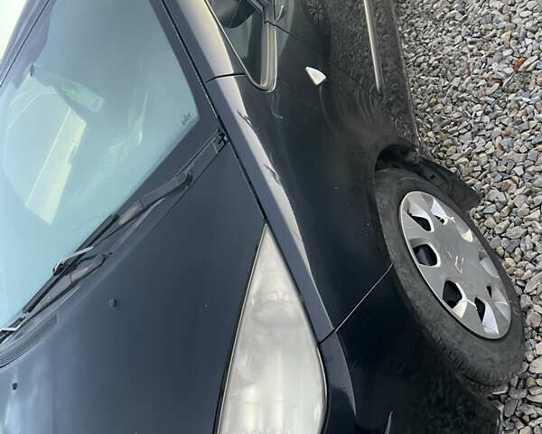 Черный Мицубиси Кольт, объемом двигателя 1.33 л и пробегом 217 тыс. км за 3900 $, фото 1 на Automoto.ua