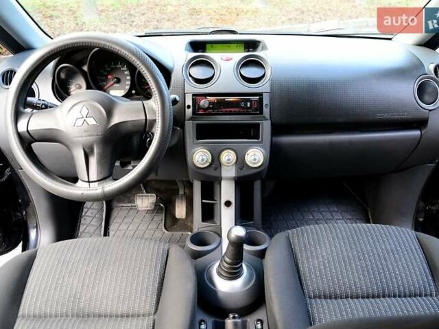 Чорний Міцубісі Кольт, об'ємом двигуна 1.32 л та пробігом 161 тис. км за 4500 $, фото 1 на Automoto.ua