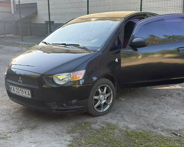 Черный Мицубиси Кольт, объемом двигателя 1.33 л и пробегом 130 тыс. км за 5700 $, фото 1 на Automoto.ua