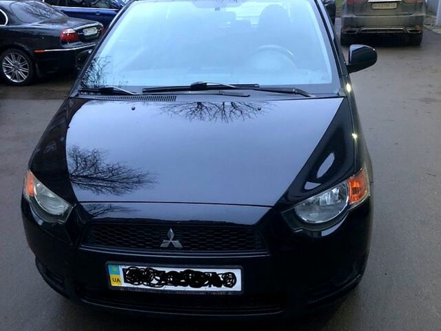 Черный Мицубиси Кольт, объемом двигателя 1.3 л и пробегом 140 тыс. км за 5300 $, фото 1 на Automoto.ua