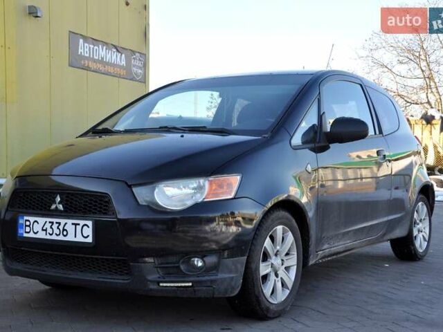 Черный Мицубиси Кольт, объемом двигателя 1.12 л и пробегом 251 тыс. км за 3800 $, фото 1 на Automoto.ua