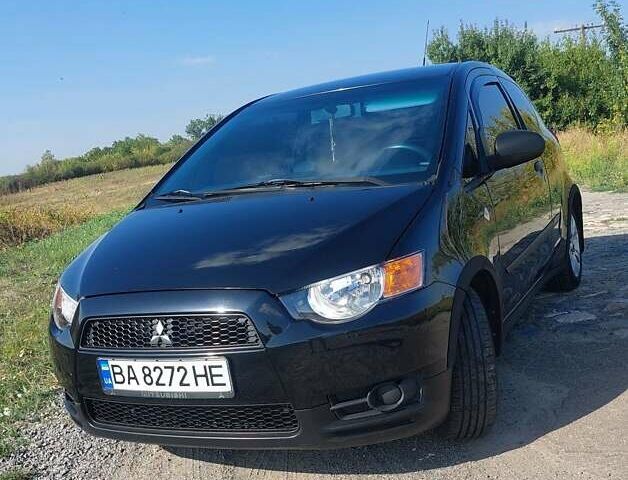 Чорний Міцубісі Кольт, об'ємом двигуна 1.33 л та пробігом 156 тис. км за 5600 $, фото 1 на Automoto.ua