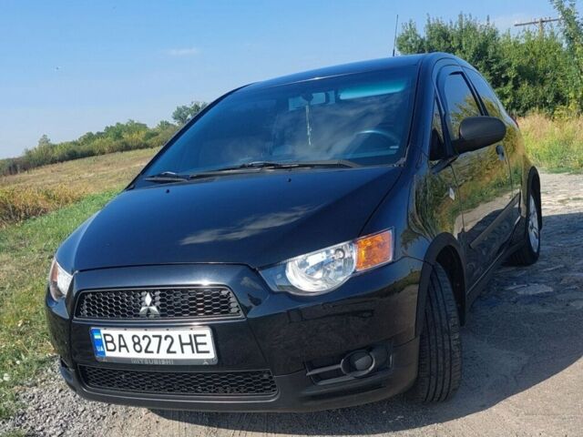 Черный Мицубиси Кольт, объемом двигателя 1.33 л и пробегом 156 тыс. км за 5600 $, фото 1 на Automoto.ua