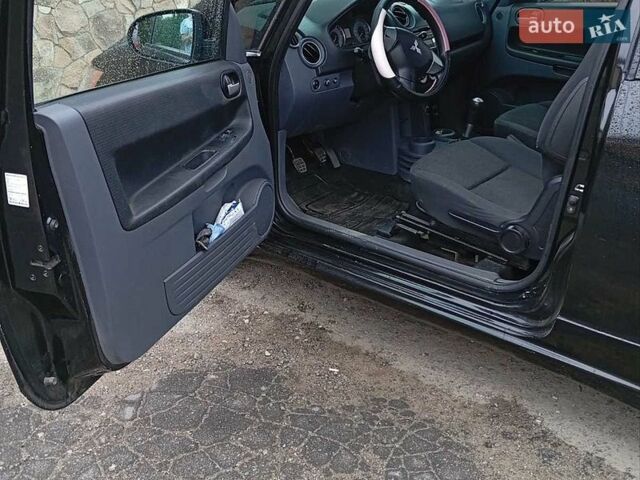 Чорний Міцубісі Кольт, об'ємом двигуна 1.12 л та пробігом 182 тис. км за 4200 $, фото 1 на Automoto.ua