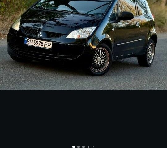 Черный Мицубиси Кольт, объемом двигателя 1.3 л и пробегом 166 тыс. км за 3500 $, фото 1 на Automoto.ua