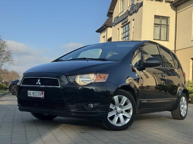 Черный Мицубиси Кольт, объемом двигателя 1.3 л и пробегом 170 тыс. км за 7100 $, фото 1 на Automoto.ua