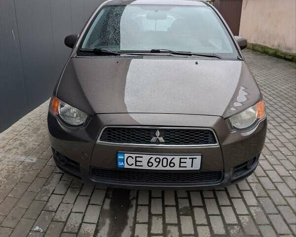 Коричневый Мицубиси Кольт, объемом двигателя 1.33 л и пробегом 110 тыс. км за 6800 $, фото 1 на Automoto.ua