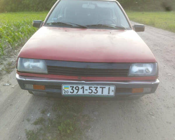 Красный Мицубиси Кольт, объемом двигателя 1.5 л и пробегом 200 тыс. км за 750 $, фото 1 на Automoto.ua