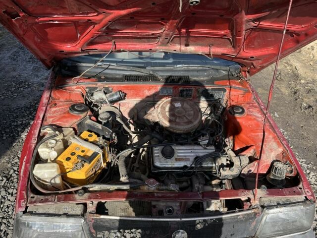 Красный Мицубиси Кольт, объемом двигателя 1.3 л и пробегом 333 тыс. км за 800 $, фото 1 на Automoto.ua