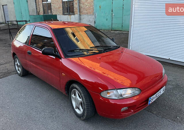 Червоний Міцубісі Кольт, об'ємом двигуна 1.3 л та пробігом 243 тис. км за 3200 $, фото 1 на Automoto.ua