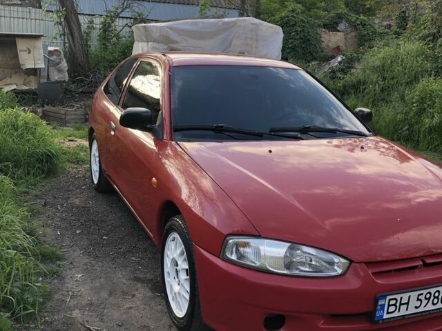 Міцубісі Кольт 2000 у Одесі на Automoto.ua Червоний Міцубісі Кольт, об'ємом двигуна 1.3 л та пробігом 1000 тис. км за 2100 $, фото 1 на Automoto.ua