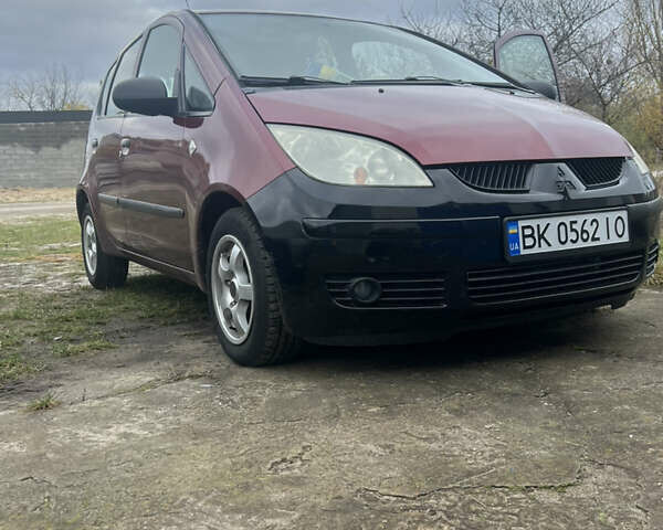 Червоний Міцубісі Кольт, об'ємом двигуна 1.4 л та пробігом 241 тис. км за 3300 $, фото 1 на Automoto.ua