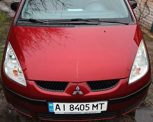 Красный Мицубиси Кольт, объемом двигателя 1.3 л и пробегом 216 тыс. км за 4100 $, фото 1 на Automoto.ua