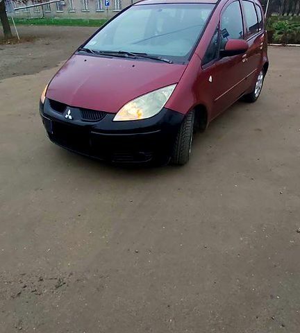Красный Мицубиси Кольт, объемом двигателя 1.5 л и пробегом 240 тыс. км за 1600 $, фото 1 на Automoto.ua