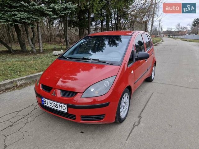 Красный Мицубиси Кольт, объемом двигателя 1.33 л и пробегом 241 тыс. км за 2850 $, фото 1 на Automoto.ua