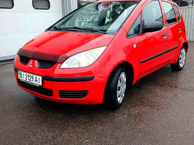 Красный Мицубиси Кольт, объемом двигателя 1.3 л и пробегом 124 тыс. км за 4500 $, фото 1 на Automoto.ua