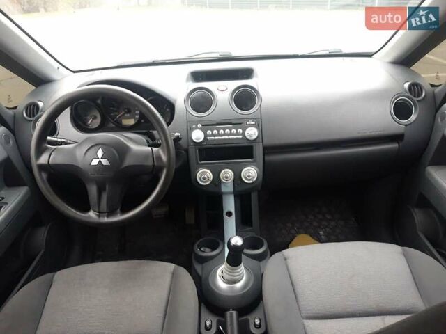 Червоний Міцубісі Кольт, об'ємом двигуна 1.33 л та пробігом 301 тис. км за 3499 $, фото 1 на Automoto.ua