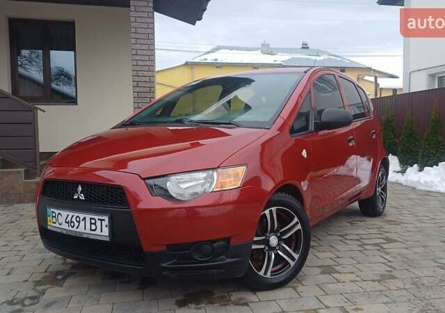 Красный Мицубиси Кольт, объемом двигателя 1.33 л и пробегом 132 тыс. км за 5890 $, фото 1 на Automoto.ua