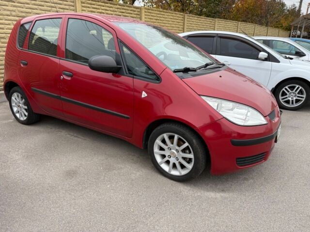 Красный Мицубиси Кольт, объемом двигателя 1.3 л и пробегом 166 тыс. км за 4999 $, фото 1 на Automoto.ua