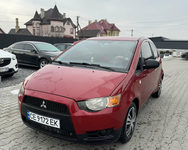 Красный Мицубиси Кольт, объемом двигателя 1.12 л и пробегом 128 тыс. км за 3500 $, фото 1 на Automoto.ua