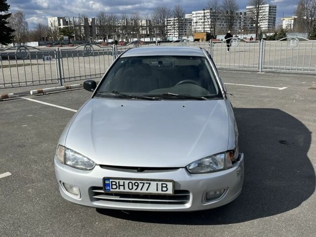 Серый Мицубиси Кольт, объемом двигателя 1.6 л и пробегом 316 тыс. км за 800 $, фото 1 на Automoto.ua