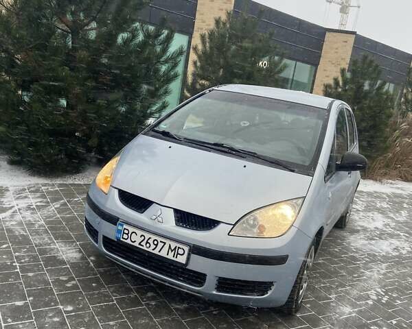 Серый Мицубиси Кольт, объемом двигателя 1.33 л и пробегом 266 тыс. км за 3300 $, фото 1 на Automoto.ua
