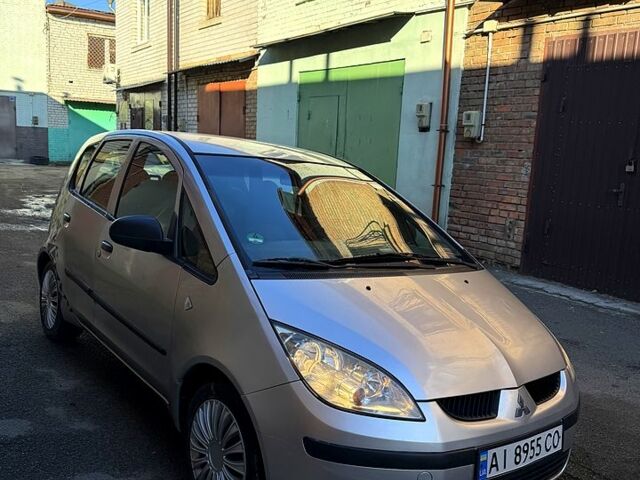 Серый Мицубиси Кольт, объемом двигателя 1.5 л и пробегом 250 тыс. км за 3400 $, фото 1 на Automoto.ua