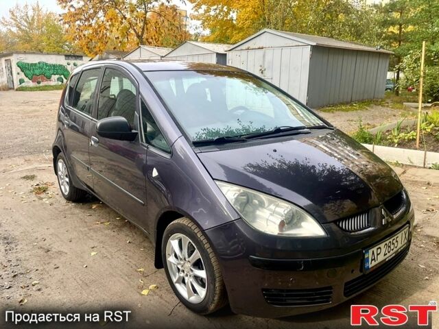 Серый Мицубиси Кольт, объемом двигателя 1.3 л и пробегом 114 тыс. км за 4300 $, фото 1 на Automoto.ua