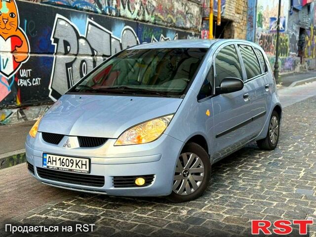 Серый Мицубиси Кольт, объемом двигателя 1.3 л и пробегом 219 тыс. км за 3700 $, фото 1 на Automoto.ua