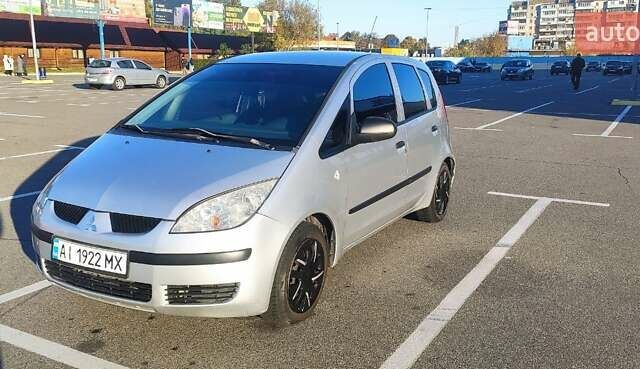 Серый Мицубиси Кольт, объемом двигателя 1.12 л и пробегом 218 тыс. км за 3550 $, фото 1 на Automoto.ua