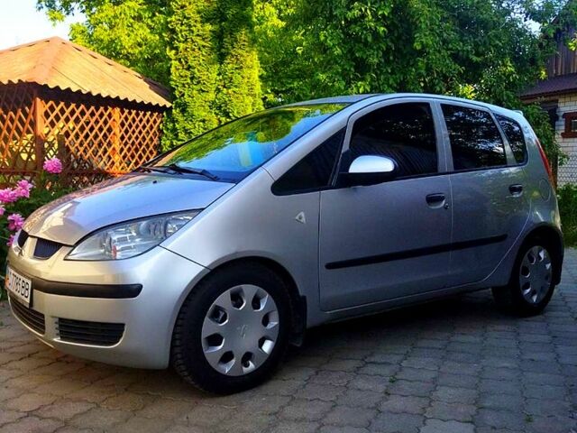 Серый Мицубиси Кольт, объемом двигателя 1.3 л и пробегом 228 тыс. км за 3800 $, фото 1 на Automoto.ua