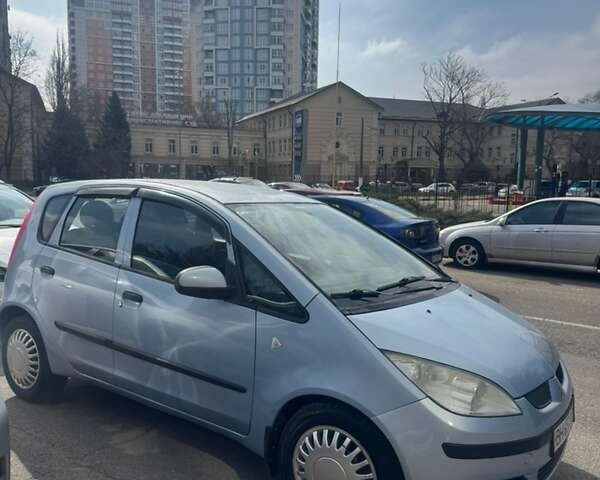 Серый Мицубиси Кольт, объемом двигателя 1.33 л и пробегом 104 тыс. км за 3600 $, фото 1 на Automoto.ua