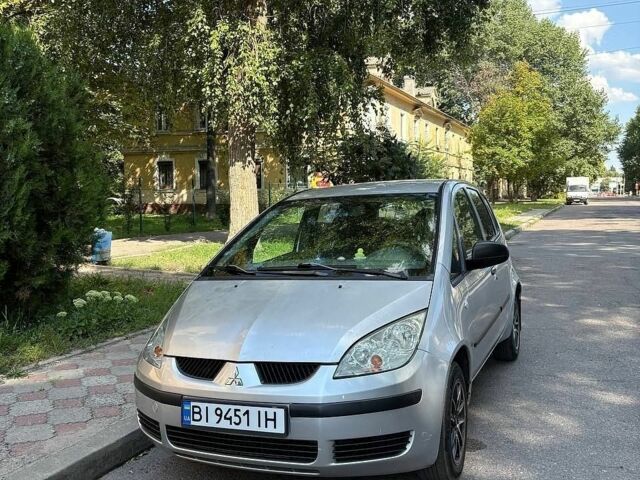 Серый Мицубиси Кольт, объемом двигателя 1.3 л и пробегом 144 тыс. км за 3600 $, фото 1 на Automoto.ua