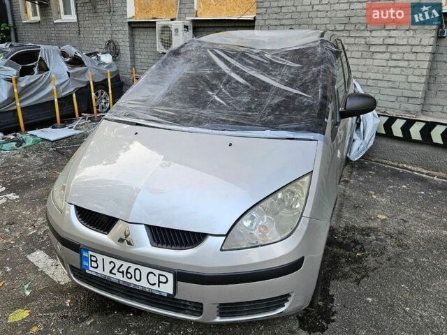 Серый Мицубиси Кольт, объемом двигателя 1.33 л и пробегом 170 тыс. км за 1500 $, фото 1 на Automoto.ua