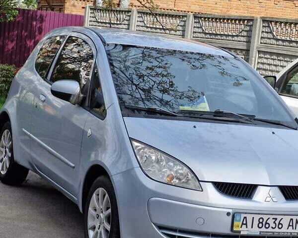 Серый Мицубиси Кольт, объемом двигателя 1.3 л и пробегом 212 тыс. км за 4000 $, фото 1 на Automoto.ua