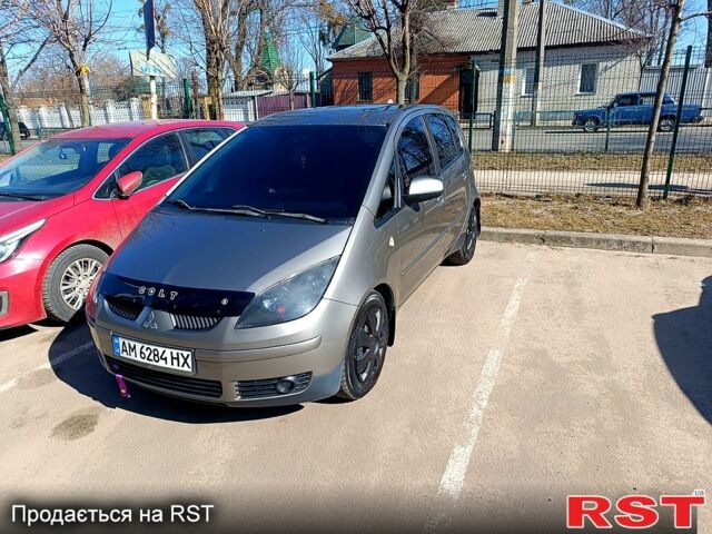 Серый Мицубиси Кольт, объемом двигателя 1.3 л и пробегом 246 тыс. км за 4100 $, фото 1 на Automoto.ua