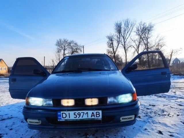 Синий Мицубиси Кольт, объемом двигателя 1.5 л и пробегом 1000 тыс. км за 807 $, фото 1 на Automoto.ua