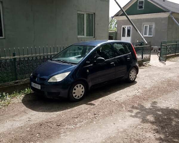 Синій Міцубісі Кольт, об'ємом двигуна 1.12 л та пробігом 269 тис. км за 4000 $, фото 1 на Automoto.ua