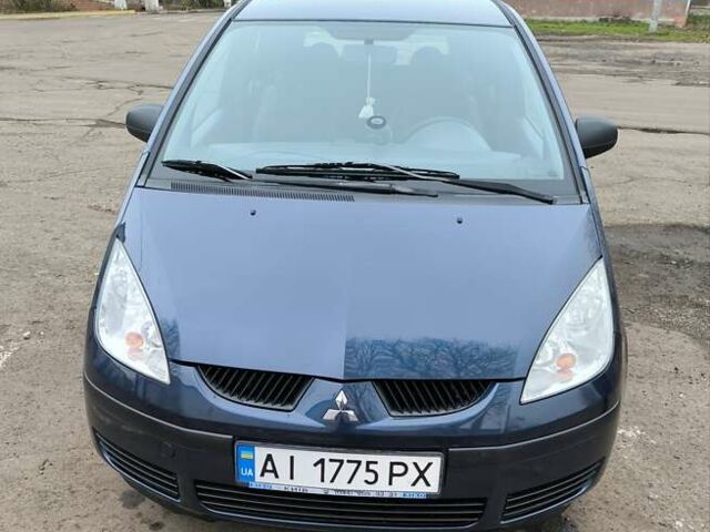 Синий Мицубиси Кольт, объемом двигателя 1.33 л и пробегом 100 тыс. км за 5500 $, фото 1 на Automoto.ua