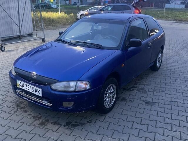 Синій Міцубісі Кольт, об'ємом двигуна 1.3 л та пробігом 330 тис. км за 1000 $, фото 1 на Automoto.ua