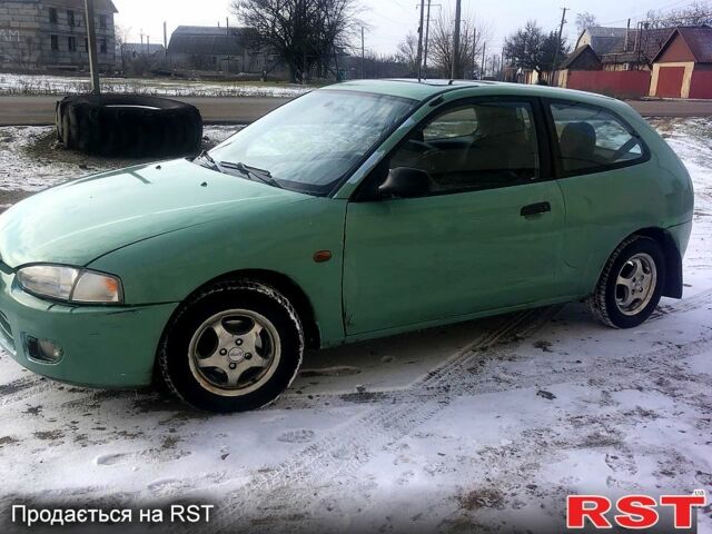 Зеленый Мицубиси Кольт, объемом двигателя 1.3 л и пробегом 55 тыс. км за 1200 $, фото 1 на Automoto.ua