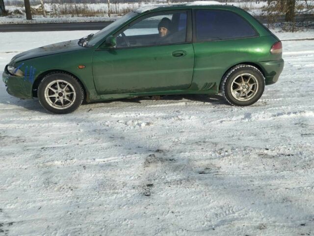 Зеленый Мицубиси Кольт, объемом двигателя 1.3 л и пробегом 1 тыс. км за 750 $, фото 1 на Automoto.ua