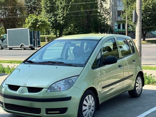 Зеленый Мицубиси Кольт, объемом двигателя 1.3 л и пробегом 245 тыс. км за 4200 $, фото 1 на Automoto.ua
