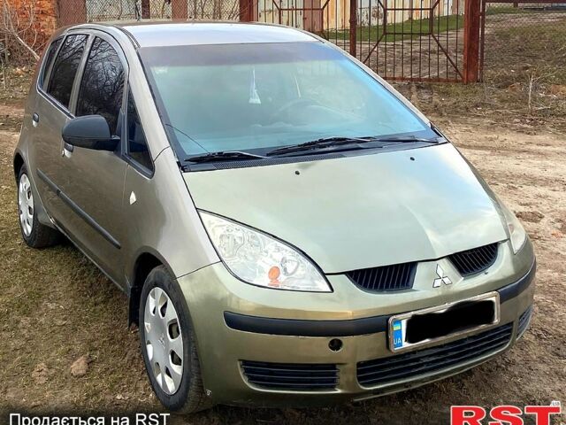 Зеленый Мицубиси Кольт, объемом двигателя 1.3 л и пробегом 180 тыс. км за 4000 $, фото 1 на Automoto.ua