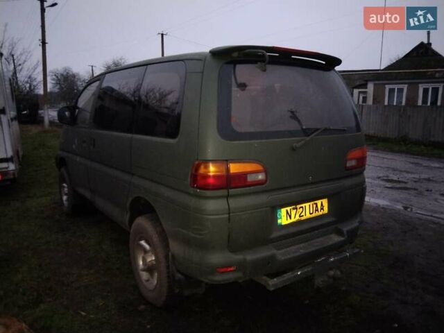 Серый Мицубиси Делика, объемом двигателя 2.8 л и пробегом 175 тыс. км за 5000 $, фото 1 на Automoto.ua