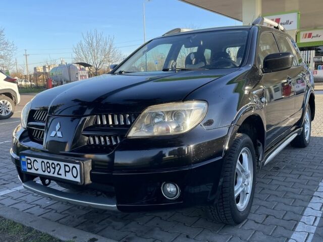 Черный Мицубиси Диамант, объемом двигателя 2 л и пробегом 218 тыс. км за 6100 $, фото 1 на Automoto.ua