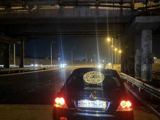 Черный Мицубиси Другая, объемом двигателя 1.6 л и пробегом 210 тыс. км за 5700 $, фото 1 на Automoto.ua