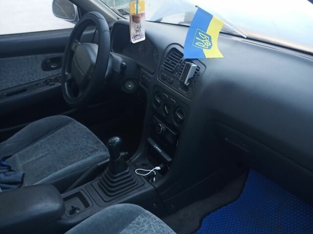 Сірий Міцубісі Інша, об'ємом двигуна 2 л та пробігом 340 тис. км за 1800 $, фото 1 на Automoto.ua